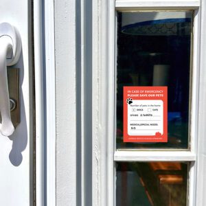 Pet emergency decal affixed to window 