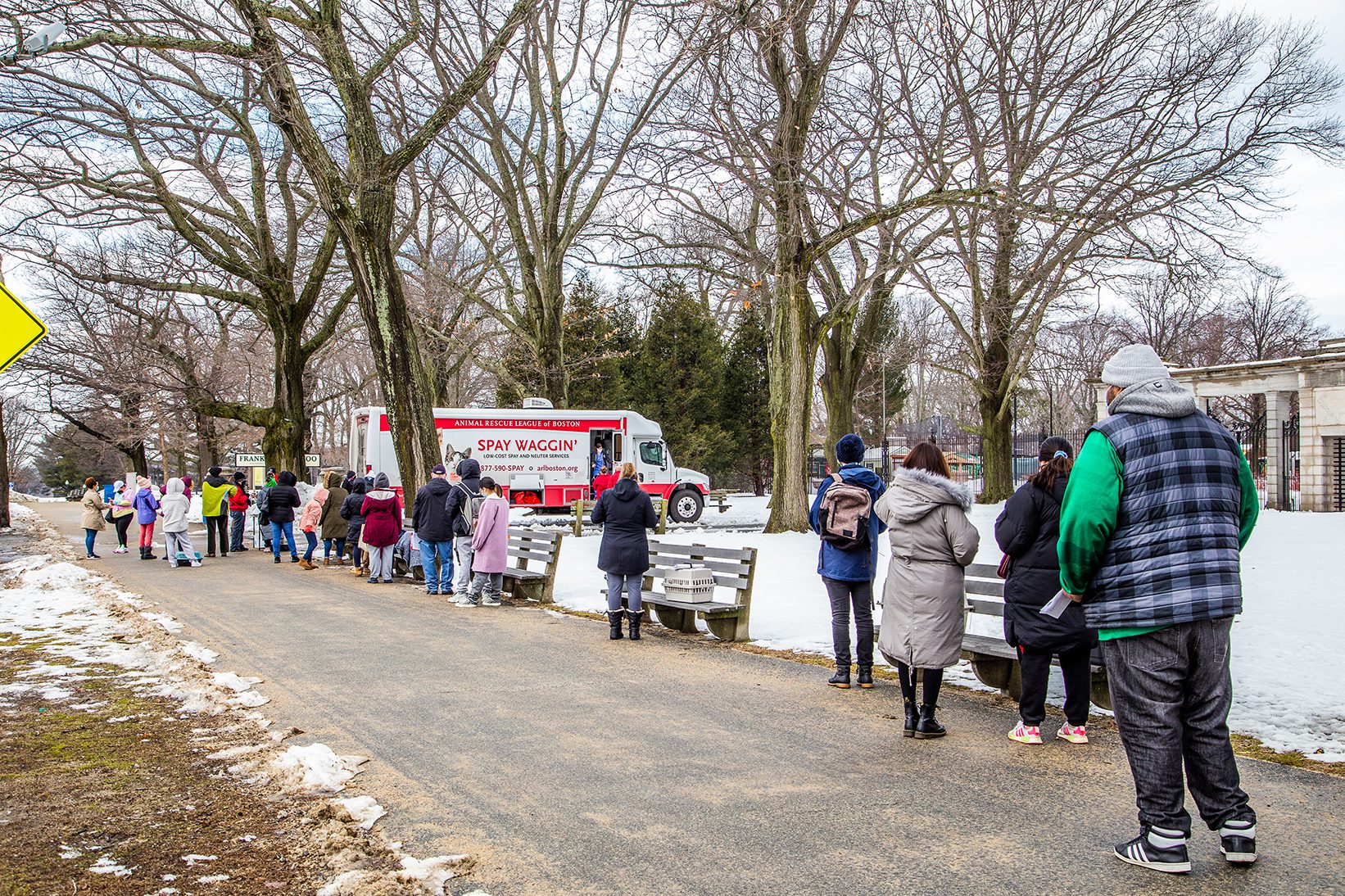 Clients wait outside ARL's Spay Waggin' with their pets 